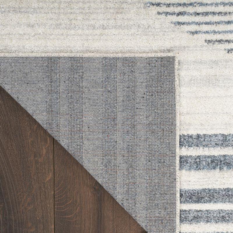Nourison Astra Machine Washable Stripe Circle Mid-Century Modern Indoor Rug Ivory Blue 5'3" x 7'