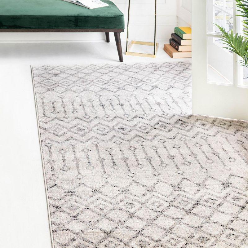 Eco-Friendly Ivory Geometric 4' x 6' Synthetic Area Rug