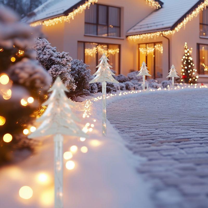 Northlight Seasonal Lighted Star Christmas Pathway Marker with Lawn Stakes White Wire - Clear Lights (Set of 4)