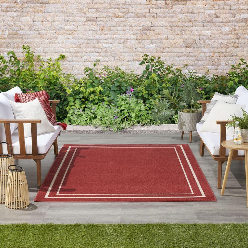 Nourison Essentials 6' x 9' Brick Ivory Contemporary Bordered Indoor/Outdoor Area Rug