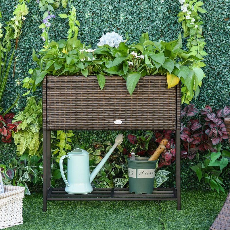 Outsunny Outdoor Flower Stand with legs, Rattan Wicker Look, Tool Storage Shelf, Portable Design for Herbs, Vegetables, Flowers, Brown