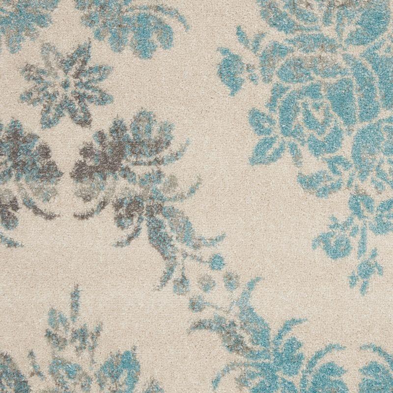 Elegant Ivory and Turquoise Floral Synthetic 6' x 9' Area Rug