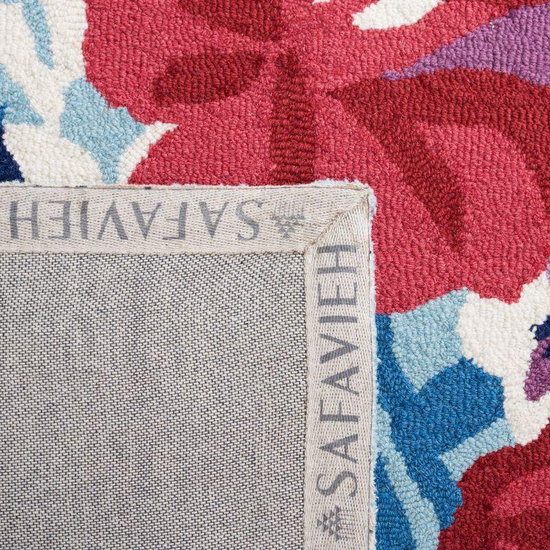 Chelsea HK219 Hand Tufted Area Rug - Blue/Rose - 4'x6' - Safavieh.