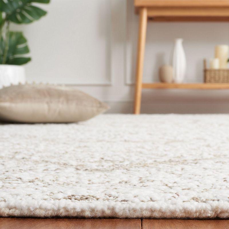 Ivory Rectangular Tufted Wool and Synthetic Rug, 5' x 8'