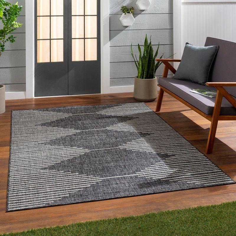 Okswerd Charcoal Woven 6'7" Round Indoor and Outdoor Area Rug