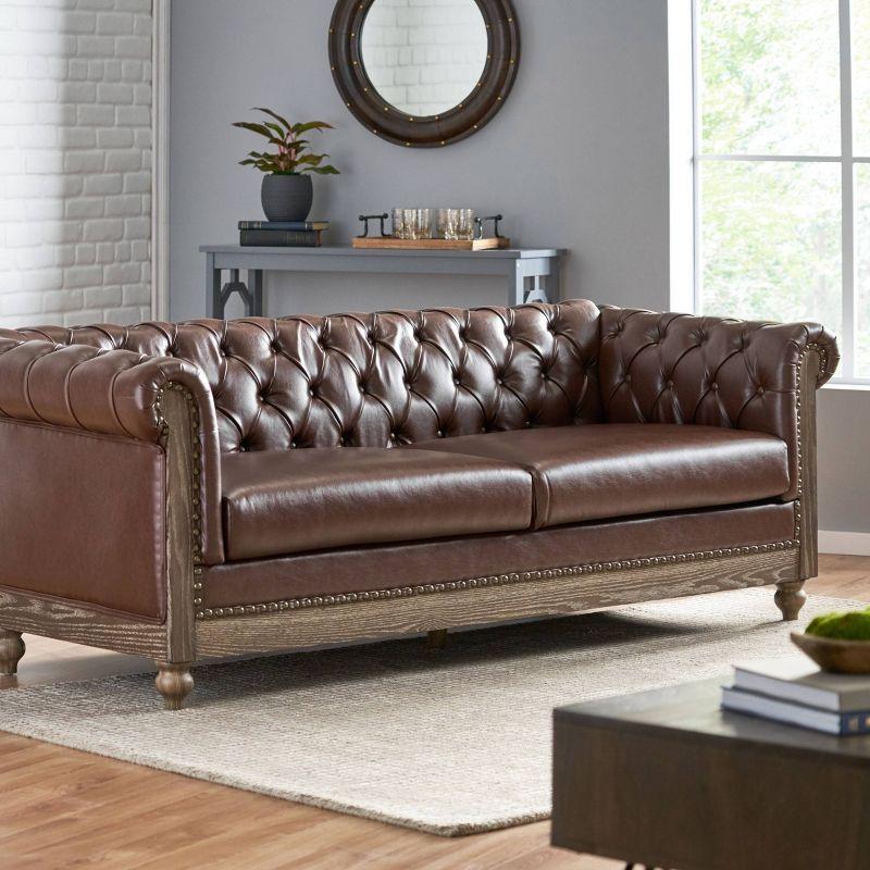 Castalia Chesterfield Dark Brown Faux Leather Sofa with Nailhead Trim