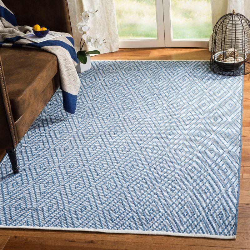 Blue and Ivory Geometric Cotton 4' x 6' Area Rug