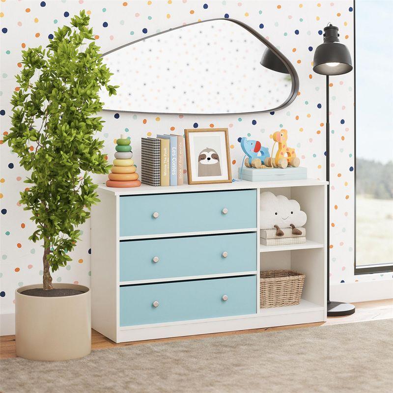 White and Light Blue Nursery Dresser with Fabric Bins