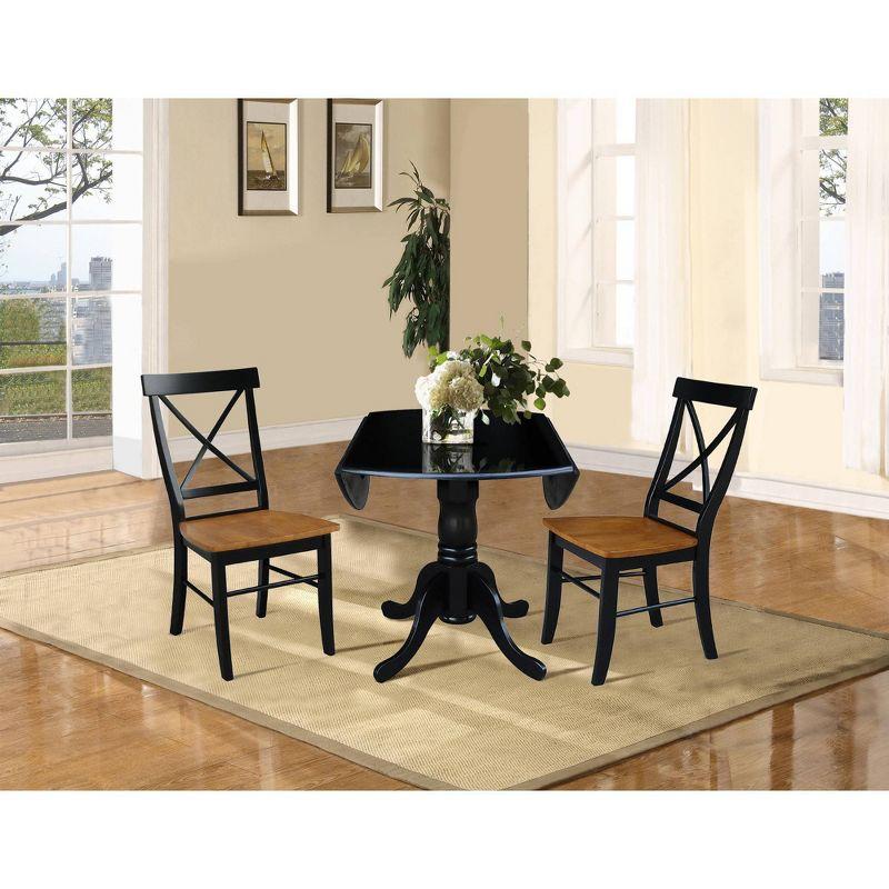 3pc Dining Set with a Dual Drop Leaf Dining Table and 2 Cross Back Dining Chairs Black/Cherry - International Concepts: Compact, Space-Saving Design