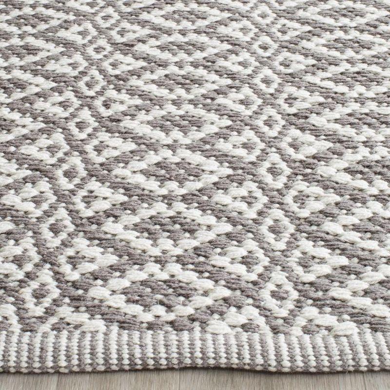 Montauk MTK716 Hand Woven Indoor Rug - Safavieh