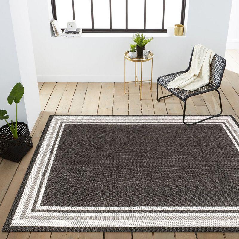 5' x 8' James Modern Border Stripe Indoor/Outdoor Area Rug, Black/Cream - JONATHAN Y
