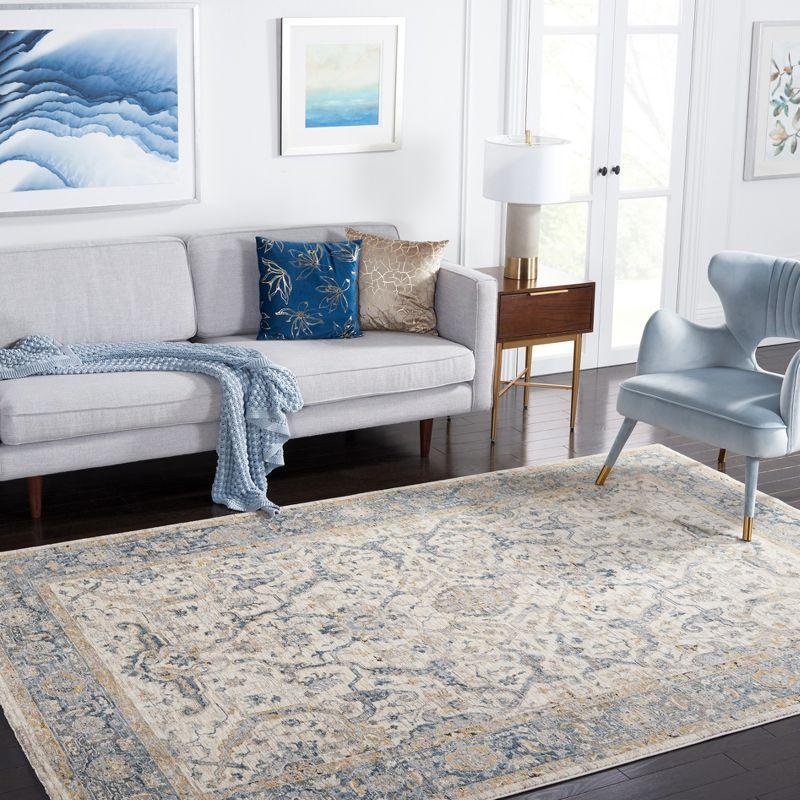 Ivory and Blue Synthetic Persian Style 5' x 8' Area Rug