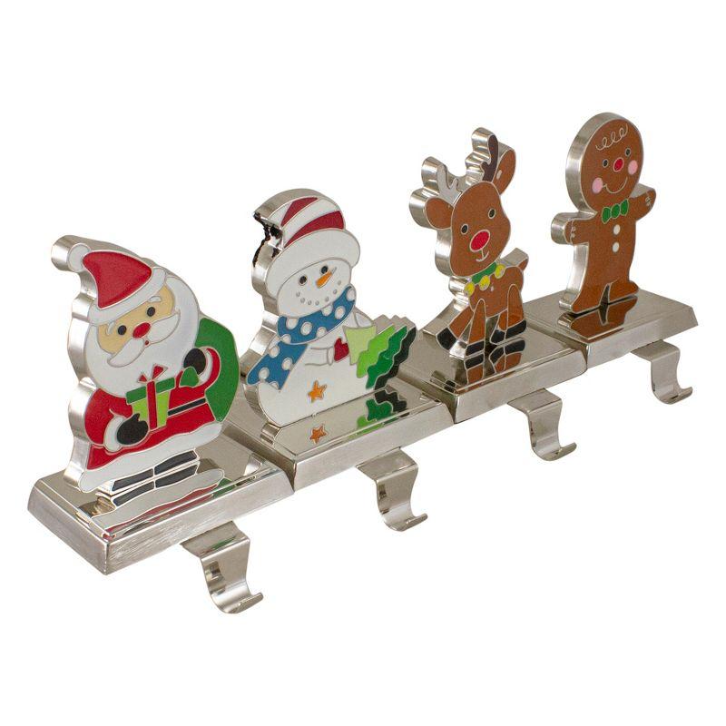 Northlight Set of 4 Christmas Figures Stocking Holders with Silver Base