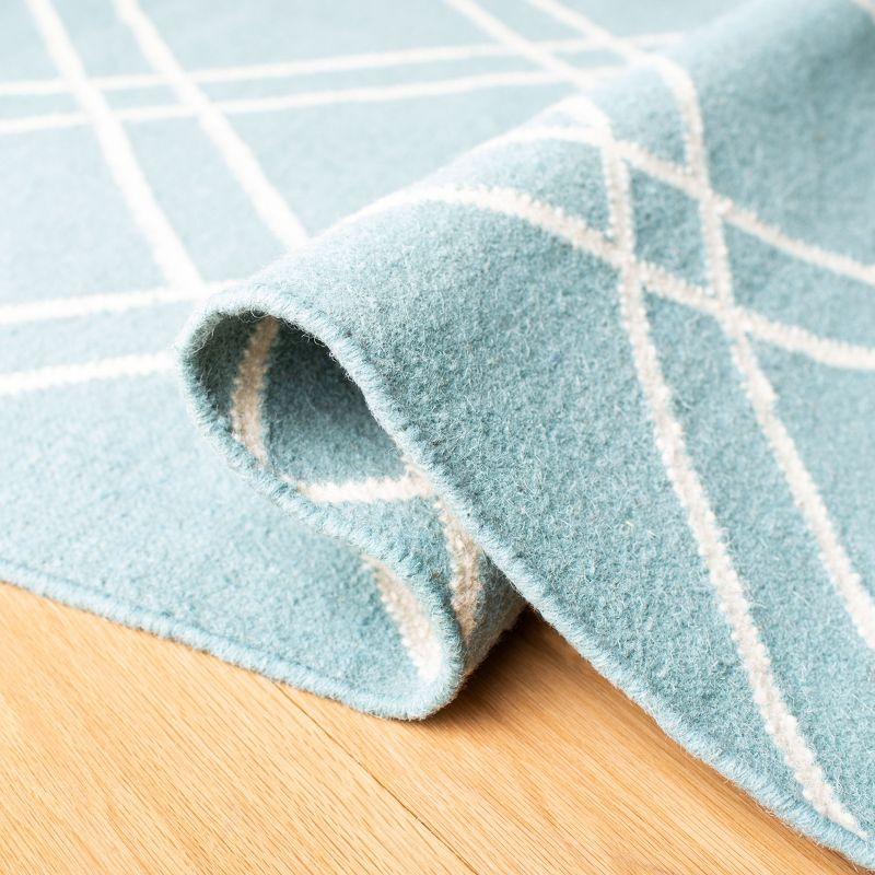 Dhurries DHU638 Hand Woven Area Rug - Light Blue/Ivory - 5'x8' - Safavieh.