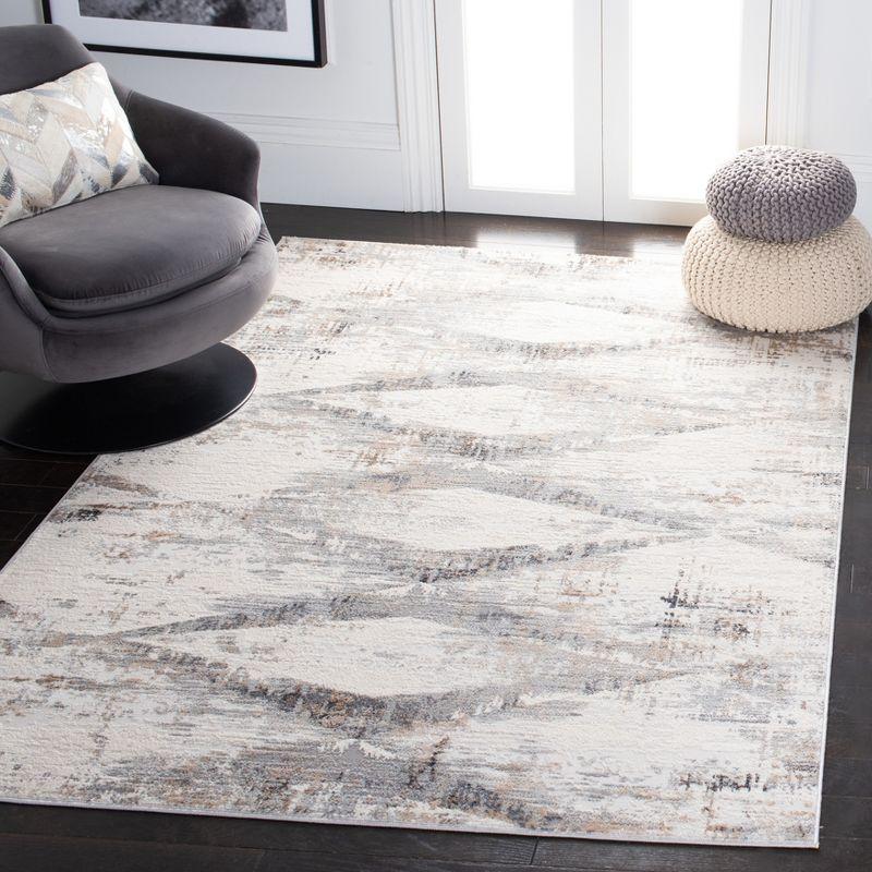 Ivory and Gold Geometric Flat Woven Synthetic Area Rug