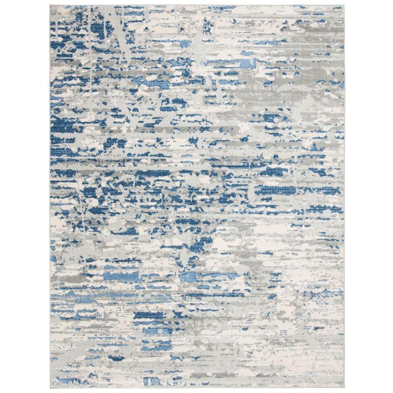 Ivory/Blue Abstract Synthetic 8' x 10' Easy Care Area Rug