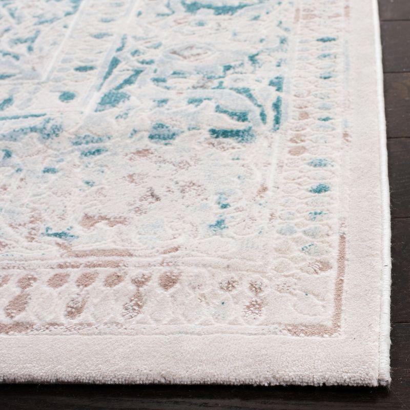 Ivory and Turquoise Hand-knotted Synthetic Rectangular Rug