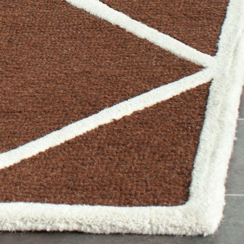 Handmade Dark Brown and Ivory Tufted Wool Round Rug