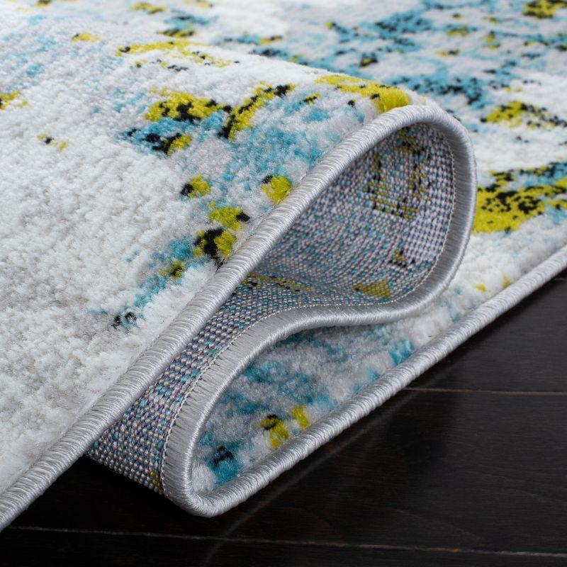 Trent Austin Design® Hollman Abstract Teal/Green/White Area Rug