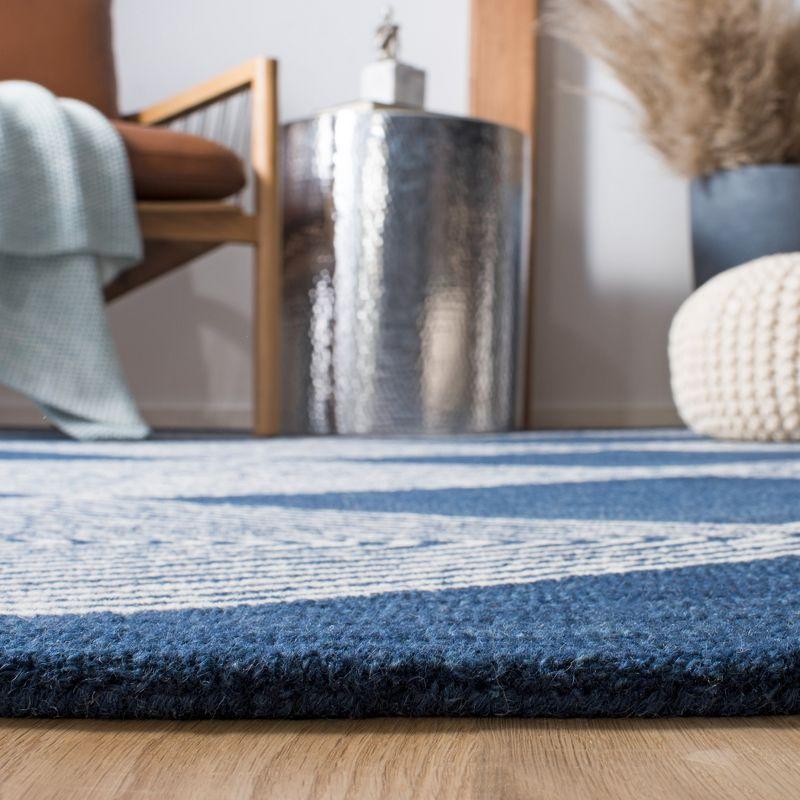 Ivory and Navy Round Hand-Tufted Wool Area Rug