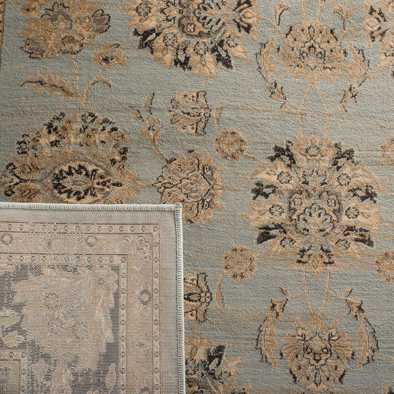 Vintage VTG575 Power Loomed Area Rug Light Blue / Brown 6'-7" X 9'-2" - Safavieh.