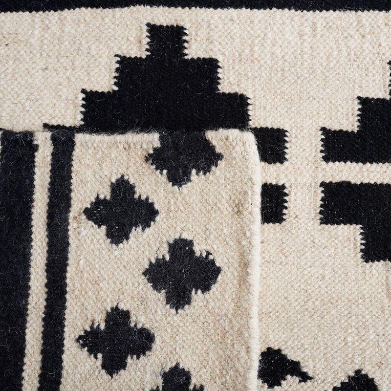 Aderinsola Flatweave Wool Southwestern Rug