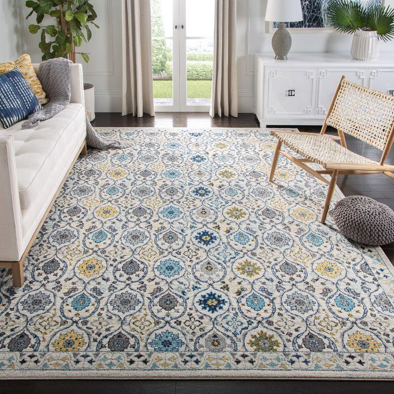 Evoke EVK210 Power Loomed Area Rug - Ivory/Blue - 6'7"x9' - Safavieh.