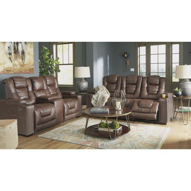 Brown Tufted Faux Leather Reclining Sofa with Storage and Cup Holder