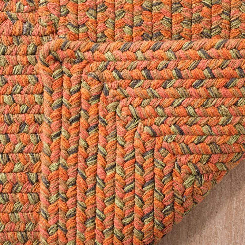 Handmade Orange Braided Cotton Oval Area Rug