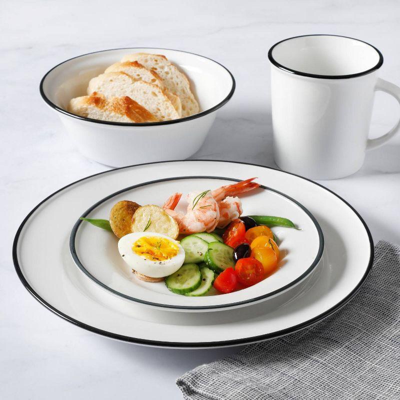 16-Piece White Porcelain Dinnerware Set with Black Trim