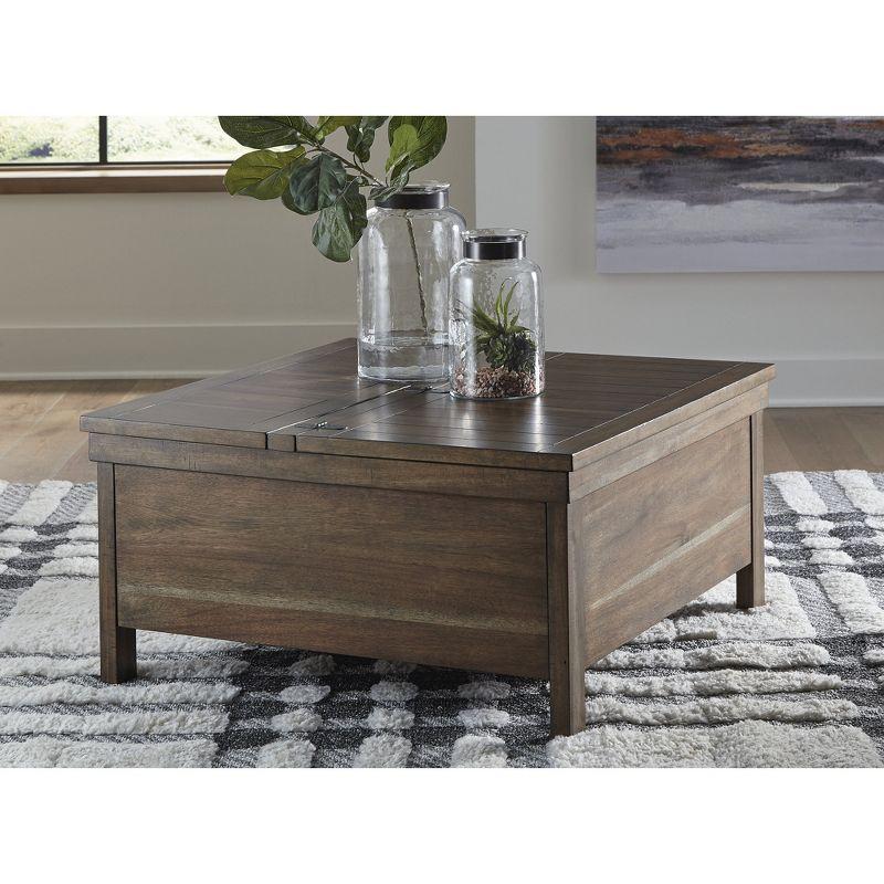 Signature Design by Ashley Moriville Rustic Hinged and Lift Top Cocktail Table with Hidden Storage, Light Brown