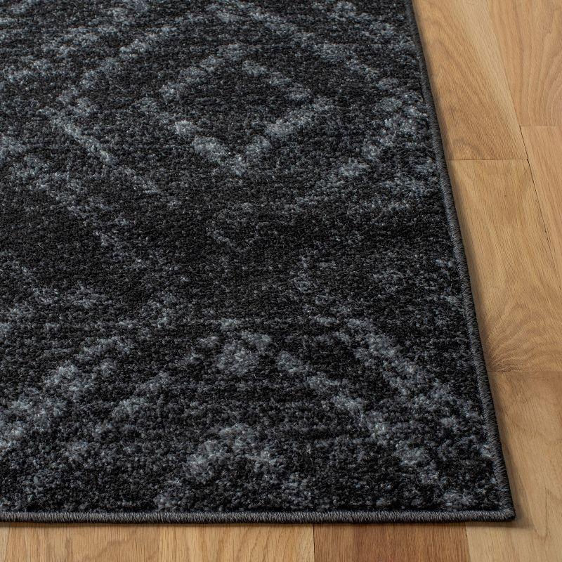 Dark Grey Geometric 4' x 6' Reversible Synthetic Area Rug