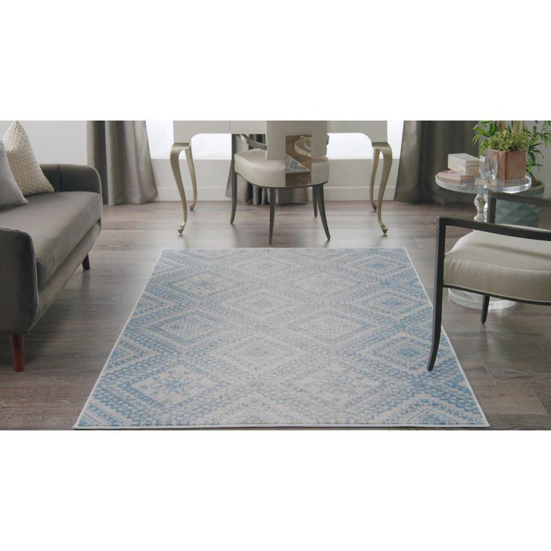 Bohemian Ivory Blue Geometric 2' x 3' Easy-Care Area Rug