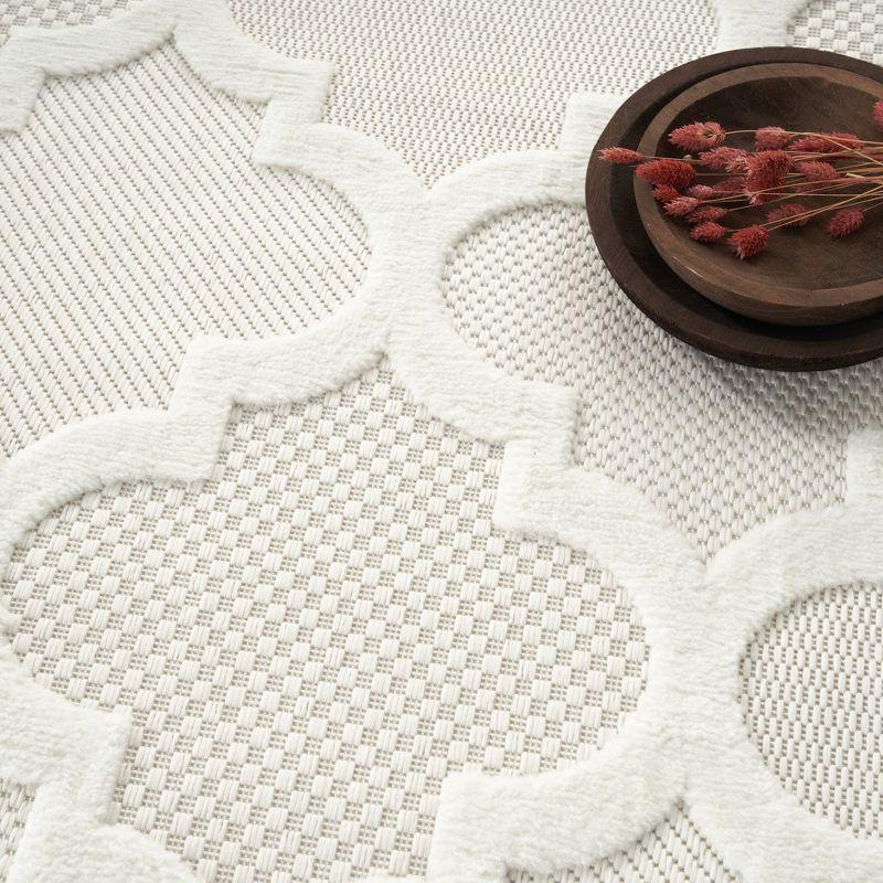 Nourison Easy Care 7' x 10' Ivory/White Indoor/Outdoor Rug