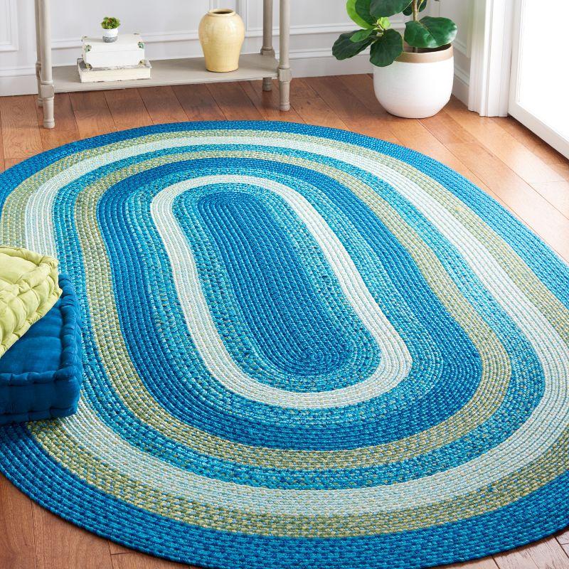 Aqua and Green Oval Braided Synthetic Area Rug 5' x 8'