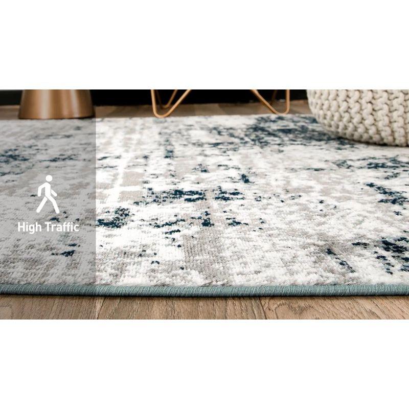 Reversible Distressed Abstract Gray 5' x 7' Synthetic Area Rug