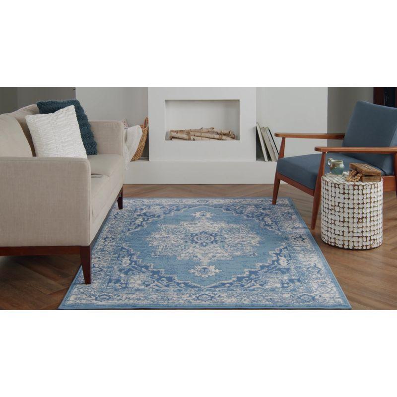 Ivory Blue Floral Synthetic 5' x 7' Reversible Area Rug