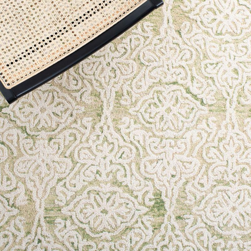 Handmade Light Green and Ivory Floral Wool Rug, 6' x 9'