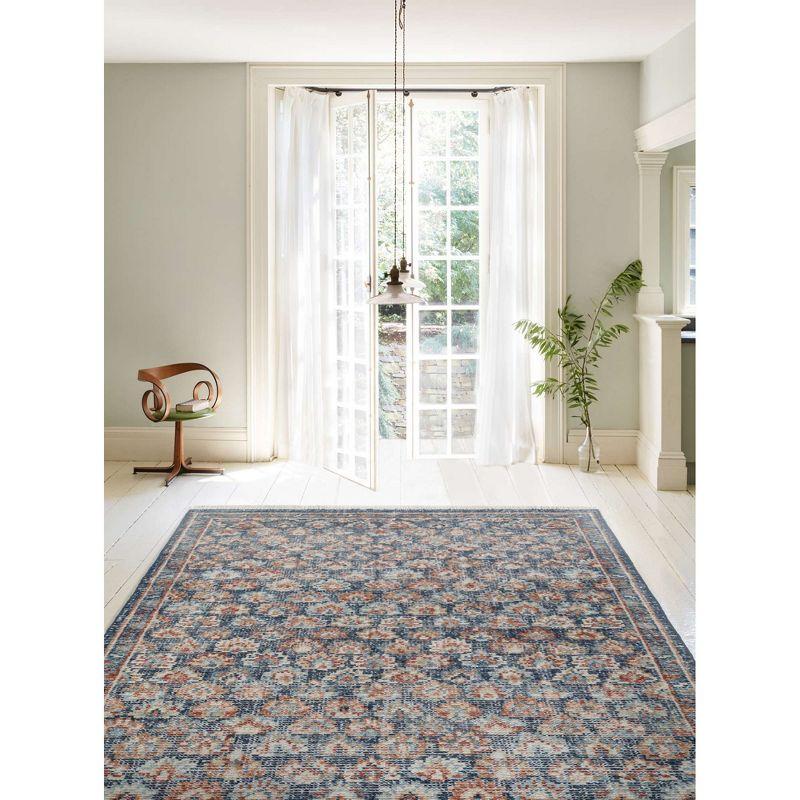 Handmade Blue Wool Floral 8' x 10' Area Rug