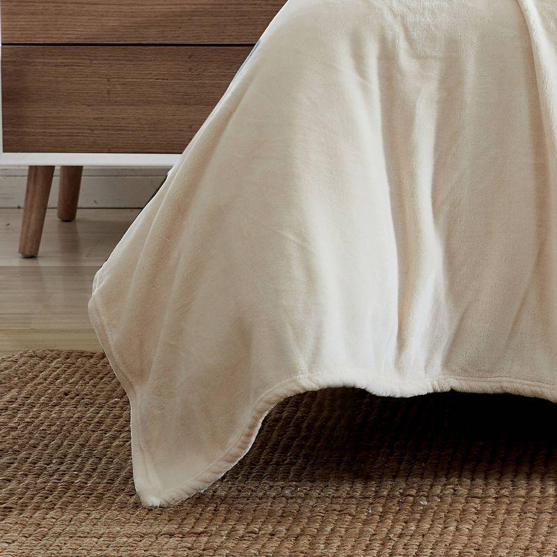 Cozy Twin-Sized Fleece Packable Blanket in Ivory