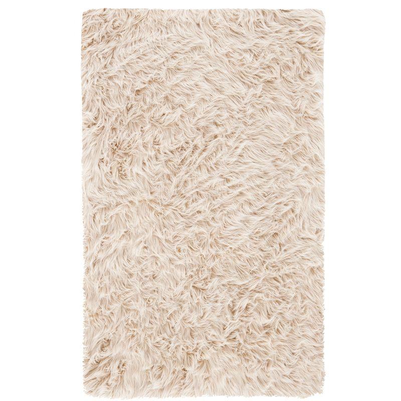 Ivory Elegance 24" Hand-Knotted Faux Sheepskin Rug