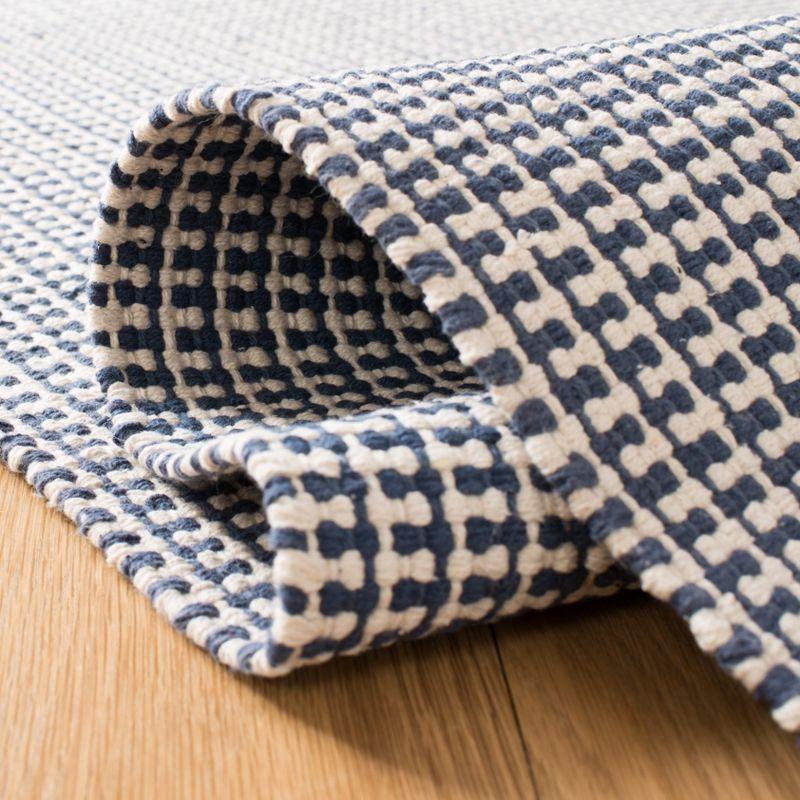 Montauk MTK340 Hand Woven Indoor Area Rug - Ivory/Navy - 5'x8' - Safavieh