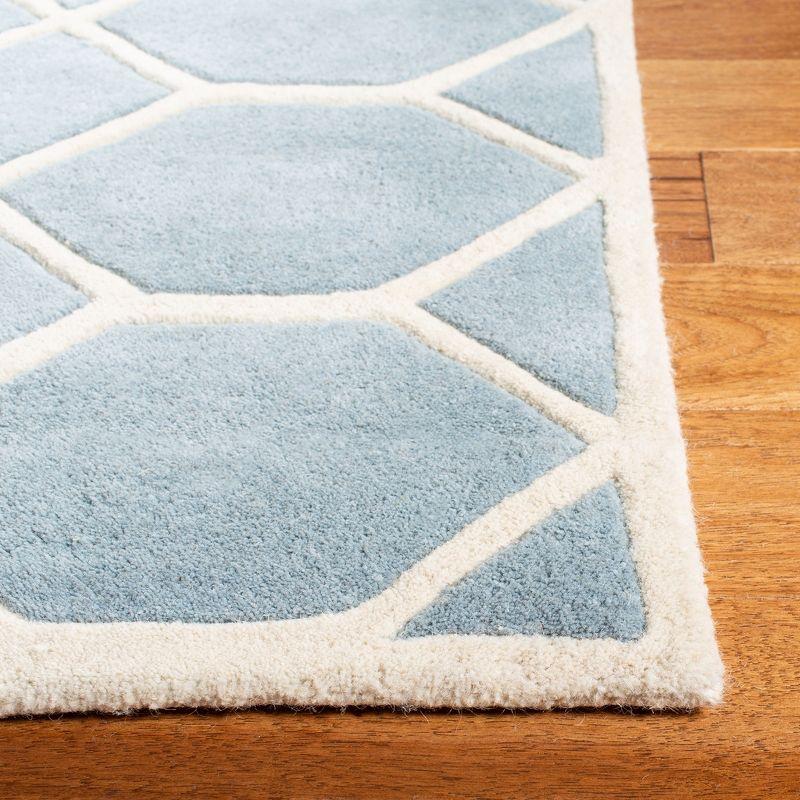 Blue and Ivory Geometric Hand-Tufted Wool Area Rug, 6' x 9'