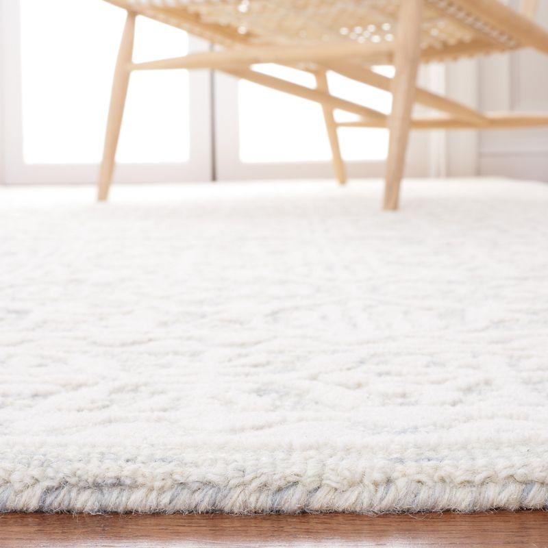 Ivory Rectangular Hand-Tufted Wool Area Rug