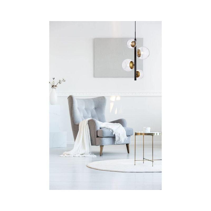 Elegant Lighting Wells 18 inch pendant in black and brass with clear shade