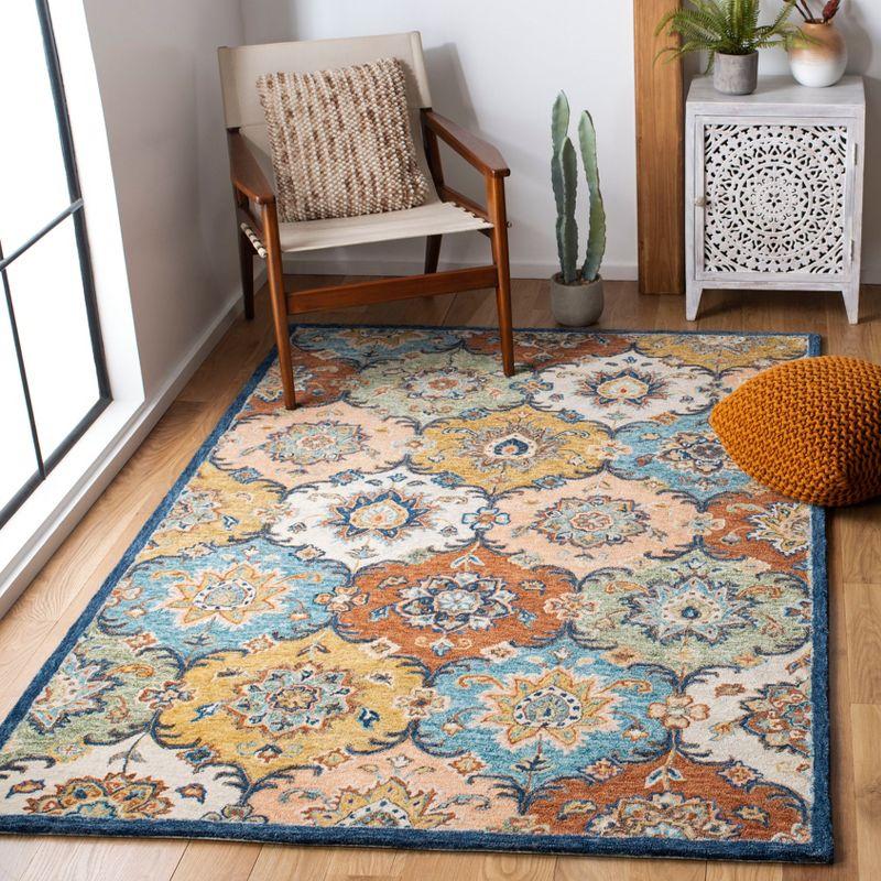 Heritage Blue and Rust Hand-Tufted Wool 4' x 6' Area Rug