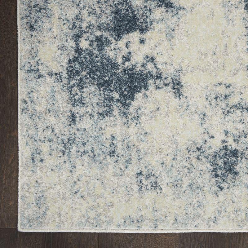 Ivory Blue Abstract 6'6" x 9'6" Area Rug