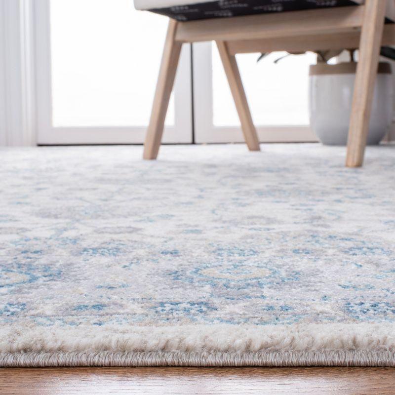 Ivory and Blue Synthetic Hand-knotted Area Rug