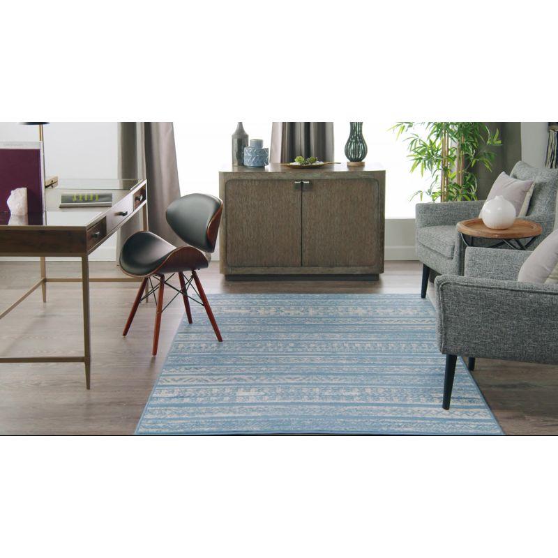 Ivory Blue Geometric Synthetic 6' x 9' Easy-Care Area Rug