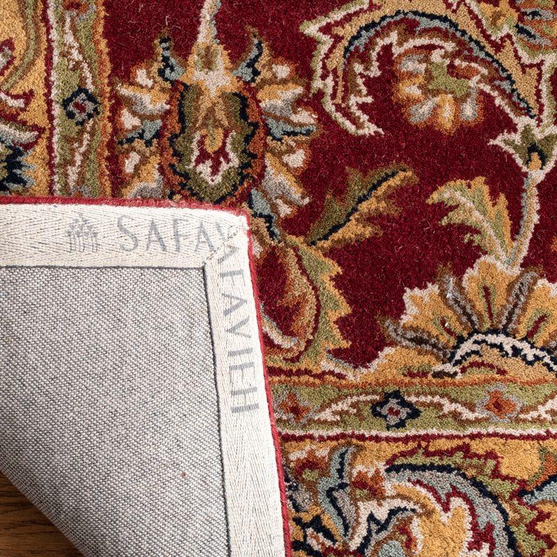 Classic CL758 Hand Tufted Area Rug - Red/Gold - 5'x8' - Safavieh.